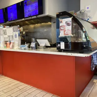 Ordering counter. Straight up from entrance/exit