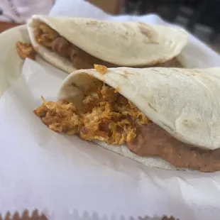 Chorizo and egg with bean tacos