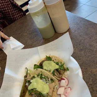 two tacos on a table