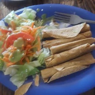 These werw my crispy carne deshebrada flautas and salad with tomato and carrots which was fresh. The horchata drink was great.