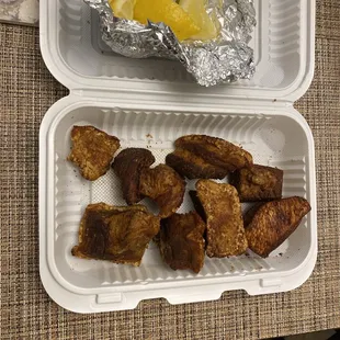a meal in a styrofoam container