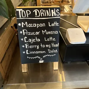 a sign for top drinks