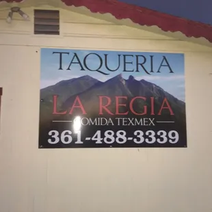 a sign on the side of a building
