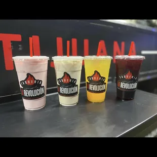 a row of taqueria cups