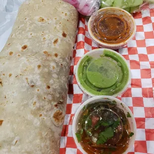 carne asada burrito with three sauces