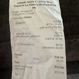 Receipt for 2 burritos, enchiladas, 1 taco, 2 lemonades.