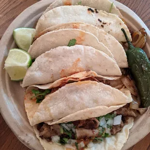 2 azada, 1 birria, 1 pastor, 1 tripa taco (extra charge for tripa and hand rolled tortillas) = 1 full dude