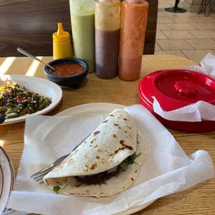 Barbacoa and 5 different hot sauces - the little one is habanero