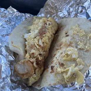 Potato with egg taco were most of the potatoes were mashed into the egg and not crispy at all.