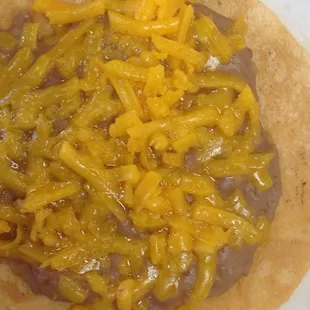 This was the bean and cheese chalupa I got. I did get it without lettuce... And the tomato was a wedged tomato that was on side.