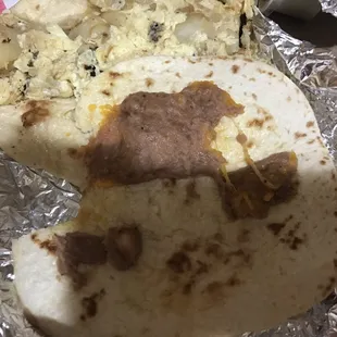 This was my bean and cheese yall let me know if y'all would pay for this. Tortilla torn. The other taco looks good idk what happened ....