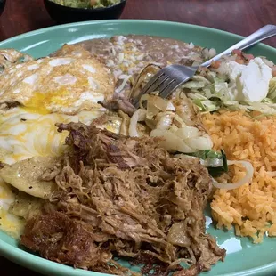 Chilaquiles w/ egg and carnitas  Very delicious