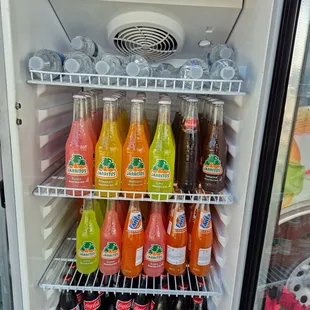 Jarritos+ Pina, Tamarindo, mandarin, Guava.  
Coca-Cola in glass.
Apple mudet. 
bottle of water.