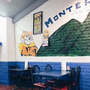 a mural on the wall of a restaurant