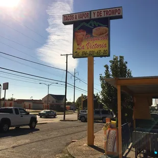 a taqueria in the middle of a street