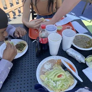 a group of people eating at a table