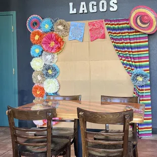 Take pictures with this cool Backdrop while you wait for your food