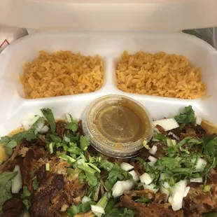 Two carnita taco plate , double rice ( no beans) . Abuela approved lol