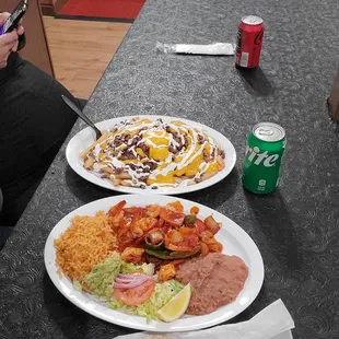 Taqueria Las Aves. Regular here, fantastic food, Camarones a la Diabla &amp; asada fries, simply irresistible! Fun atmosphere, enjoy!