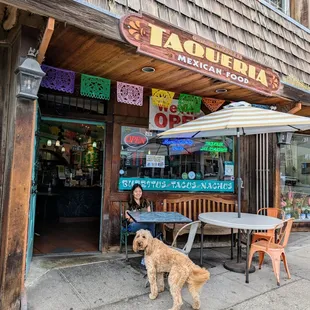 Outside. Storefront. Small, dog-friendly patio.