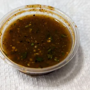 I really liked this salsa. Smokey with a decent amount of heat but not extreme. Not sure what kind of pepper was used but tasty.