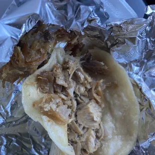 Ordered 2 carnitas tacos with no onions. To my surprise they just handed me a plain taco no cilantro, no lime, no salsa.