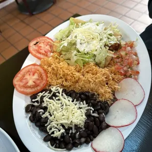 Chicken flautas with black beans and rice
