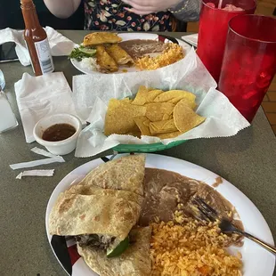 Barria tacos from the daily special and steak quesadillas.