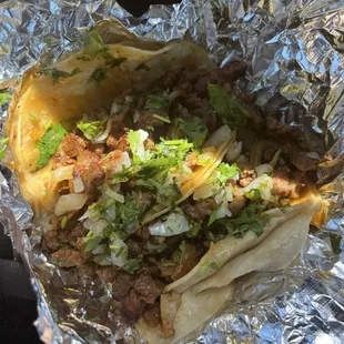 a burrito wrapped in foil