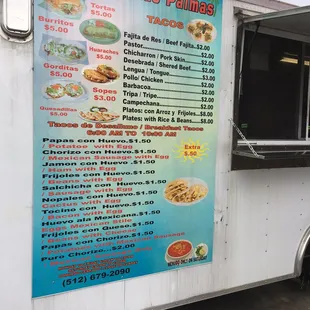 a menu on a food truck