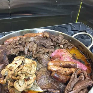 beef and mushrooms in a pan