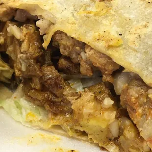 Large Burrito with meat, beans, rice, and etc...