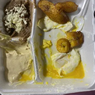 The beans are the same. Fried plantain. There is a cream sauce in the lower left corner for dipping fruit.