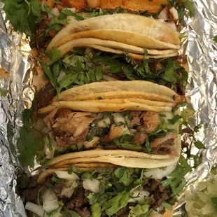 top to bottom: pastor, barbacoa, carnitas, y asada