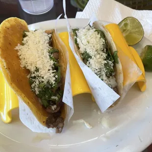 Corn steak taco and a flour steak taco