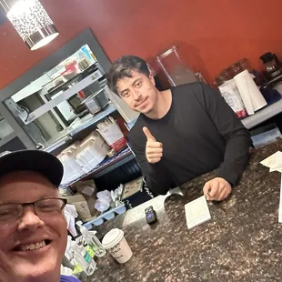 David and Luis the owner.