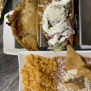 Taco Gobernador and taco Tacos de Papa with rice and beans