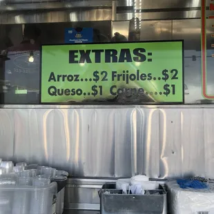 a sign for a taqueria
