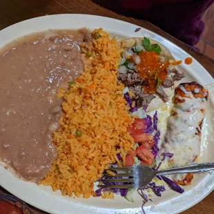 Beef burrito, beef taco, rice, and beans!