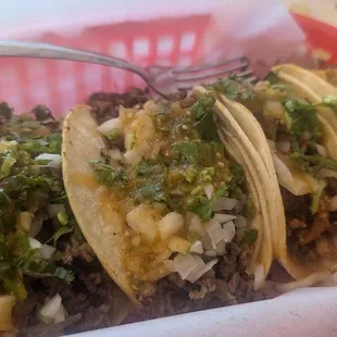 2 pastor and 2 asada tacos.