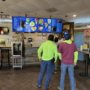 a group of people standing in line