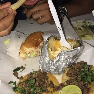 a man eating a taco