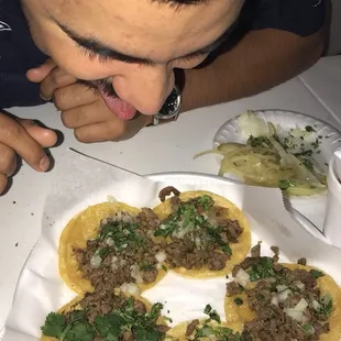 a man sticking his tongue out