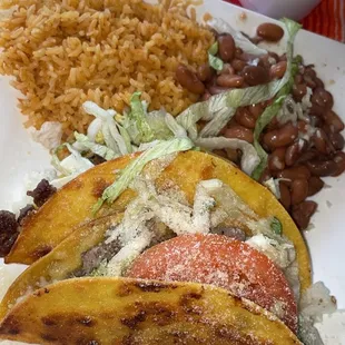 2 crispy tacos with rice &amp; beans