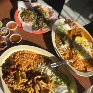 Huevos con chorizo, chilaquiles with red salsa &amp; some tacos to satisfy!