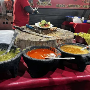 Green salsa/not spicy/tons of flavor Red/hot/ flavorful And the last one so sad I didn't try.