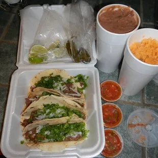4 tacos lengua (take out) plus fixings, and rice and beans. I am obsessed with those tacos. So good.