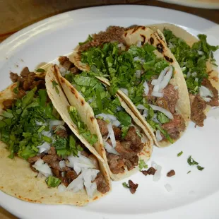 2 tacos asada (decent; a bit gristly), 2 tacos lengua (+ lime = flippin yum. JUST the way I like them.)