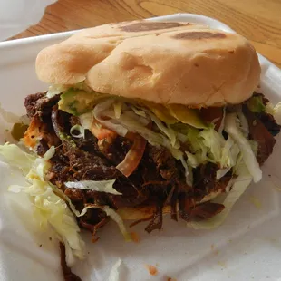 Torta with carnitas - $6.75ish. Soooo flippin delicious. Bolillo holds up better with carnitas than with lengua. 5 stars.