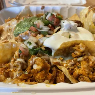 nachos in a styrofoam container